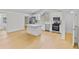 Kitchen with stainless steel appliances, a center island, and hardwood flooring at 1919 Sipes Ave, Sanford, FL 32771