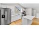 Modern kitchen featuring white cabinets and countertops with stainless steel appliances at 1919 Sipes Ave, Sanford, FL 32771
