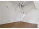 Spacious living room with vaulted ceilings, a modern ceiling fan, and wood floors at 1919 Sipes Ave, Sanford, FL 32771