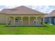 Covered patio featuring classic archways, providing a relaxing outdoor living space at 1919 Sipes Ave, Sanford, FL 32771