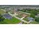 New homes feature large lots, well-manicured lawns, and an inviting neighborhood setting with mature trees at 1929 Sipes Ave, Sanford, FL 32771