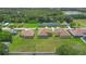 New homes feature large lots, well-manicured lawns, and an inviting neighborhood setting with mature trees and a pond at 1929 Sipes Ave, Sanford, FL 32771