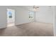 This bedroom has neutral carpet, ceiling fan and two windows at 1929 Sipes Ave, Sanford, FL 32771