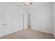 Bright bedroom with carpeted floors and double door closet at 1929 Sipes Ave, Sanford, FL 32771