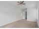 A bedroom with carpet, one window, a ceiling fan, and access to a closet at 1929 Sipes Ave, Sanford, FL 32771