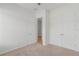 A bright bedroom featuring a closet with double doors at 1929 Sipes Ave, Sanford, FL 32771