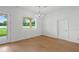 A bright dining room with hardwood floors, a chandelier, and a window with a view at 1929 Sipes Ave, Sanford, FL 32771