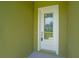 Front door entrance with glass features and modern hardware at 1929 Sipes Ave, Sanford, FL 32771