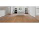 Bright kitchen with stainless appliances, island, and hardwood floors at 1929 Sipes Ave, Sanford, FL 32771