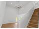 Airy living room boasting high ceilings, hardwood floors, and a staircase with wooden steps at 1929 Sipes Ave, Sanford, FL 32771