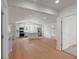 Open concept living space with bright kitchen and hard wood flooring at 1929 Sipes Ave, Sanford, FL 32771