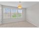 Bedroom featuring three windows at 2058 Prospect Ave, Orlando, FL 32814