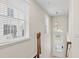 Bright entryway featuring natural light, neutral paint, and a stylish pendant light fixture at 2058 Prospect Ave, Orlando, FL 32814