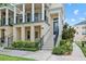 Inviting townhome with a classic design, well-manicured landscaping and a welcoming front entrance at 2058 Prospect Ave, Orlando, FL 32814