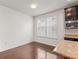 Bright kitchen area featuring hardwood floors, granite countertops, and a large window providing ample natural light at 2058 Prospect Ave, Orlando, FL 32814