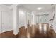 Spacious living area with hardwood floors and white columns separating the living area at 2058 Prospect Ave, Orlando, FL 32814