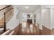 Spacious living room with hardwood floors and staircase leading to the second floor at 2058 Prospect Ave, Orlando, FL 32814