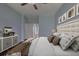Relaxing bedroom boasts soft colors, plush bedding, and ample storage, offering a peaceful escape at 2237 Wintermere Pointe Dr, Winter Garden, FL 34787