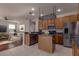 Well-equipped kitchen featuring stainless steel appliances, a center island, and seamless access to living spaces at 2237 Wintermere Pointe Dr, Winter Garden, FL 34787