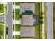 Birds-eye view showcasing a backyard with a screened-in pool and fenced yard at 2355 White Lilly Dr, Kissimmee, FL 34747