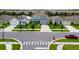 A bird's-eye view of a neighborhood with well-manicured lawns and neatly arranged houses at 2355 White Lilly Dr, Kissimmee, FL 34747