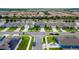 A high angle view of an organized residential community with similar styled homes at 2355 White Lilly Dr, Kissimmee, FL 34747