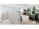 Bright and airy living room with large windows, comfortable furniture, and modern decor at 2355 White Lilly Dr, Kissimmee, FL 34747