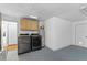 Spacious laundry room with modern appliances and storage at 241 Brittany Ave, Port Orange, FL 32127