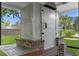 A custom-built outdoor grill is showcased, perfect for outdoor cooking and gatherings at 241 Brittany Ave, Port Orange, FL 32127