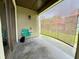 Relaxing back porch with a privacy screen and ample space for outdoor seating at 249 Afton Sq # 112, Altamonte Springs, FL 32714