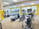 Community gym with treadmills, elliptical machines, and mirrored wall for a complete fitness experience at 249 Afton Sq # 112, Altamonte Springs, FL 32714