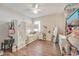 Spacious bedroom featuring bunk beds, white walls, wooden floors, and a floor length mirror at 2579 Woodside Ridge Dr, Apopka, FL 32712