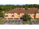 Aerial view of a multi-Gathering complex, showcasing its spacious layout and ample parking at 2717 Camaro Dr, Kissimmee, FL 34746