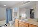 This bathroom has a tub-shower, toilet, and window at 2717 Camaro Dr, Kissimmee, FL 34746