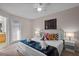 The primary bedroom has a ceiling fan and balcony access at 2717 Camaro Dr, Kissimmee, FL 34746