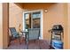 Outdoor patio with seating and a grill, perfect for relaxing and entertaining at 2717 Camaro Dr, Kissimmee, FL 34746