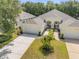Charming home with well-manicured landscaping and double garage at 3017 Glin Cir, Ormond Beach, FL 32174