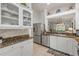 Spacious kitchen featuring granite countertops, stainless steel appliances, and ample cabinet space at 3017 Glin Cir, Ormond Beach, FL 32174