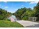 Community boat ramp surrounded by lush landscaping and mature trees at 308 N Shadowbay Blvd # 214, Longwood, FL 32779