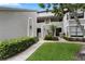 Charming home exterior with manicured landscaping, a walkway, and inviting entrance at 308 N Shadowbay Blvd # 214, Longwood, FL 32779
