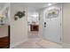Inviting foyer with decor, bright lighting, and open floor plan at 308 N Shadowbay Blvd # 214, Longwood, FL 32779