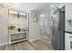 Bright kitchen featuring stainless steel appliances, neutral colors, and hardwood flooring at 308 N Shadowbay Blvd # 214, Longwood, FL 32779