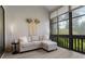 Relaxing lanai area with neutral colors and scenic views at 308 N Shadowbay Blvd # 214, Longwood, FL 32779