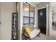 Inviting front porch featuring a cozy seat and decorative accents at 308 N Shadowbay Blvd # 214, Longwood, FL 32779