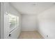 Empty bedroom featuring one window and new vinyl flooring at 320 Eaton St, Maitland, FL 32751