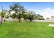 Well-maintained backyard with lush green lawn and full perimeter fence at 3312 Victory Palm Dr, Edgewater, FL 32141