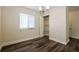 Bright bedroom features a window and a closet at 3312 Victory Palm Dr, Edgewater, FL 32141
