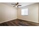 Bedroom features a ceiling fan and hardwood flooring at 3312 Victory Palm Dr, Edgewater, FL 32141