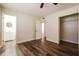 Bright bedroom with hardwood floors offers a bathroom en suite and a closet at 3312 Victory Palm Dr, Edgewater, FL 32141