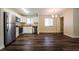 This open eat-in kitchen offers stainless appliances, granite countertops, and lots of natural light at 3312 Victory Palm Dr, Edgewater, FL 32141